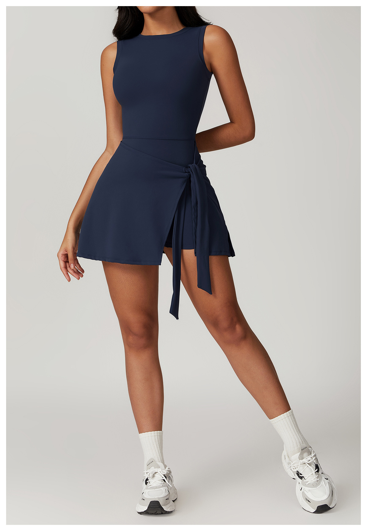 Backless athletic skort one-piece with waist tie