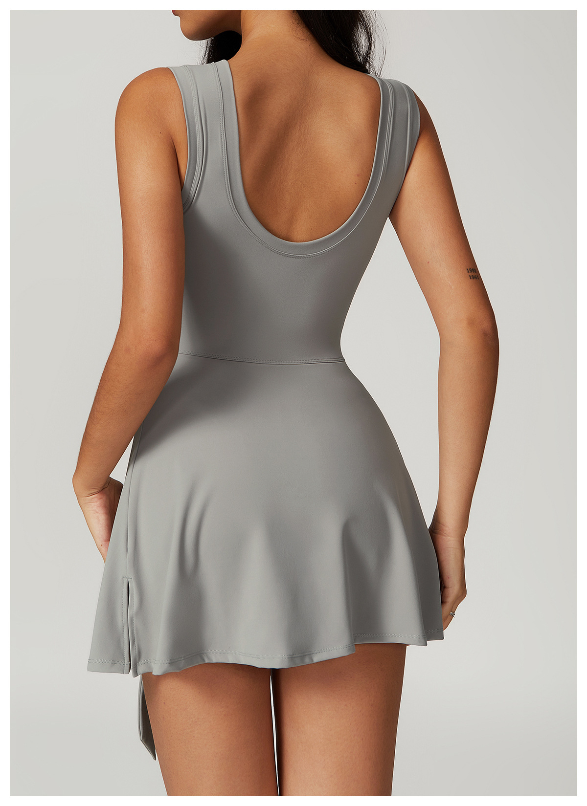 Backless athletic skort one-piece with waist tie