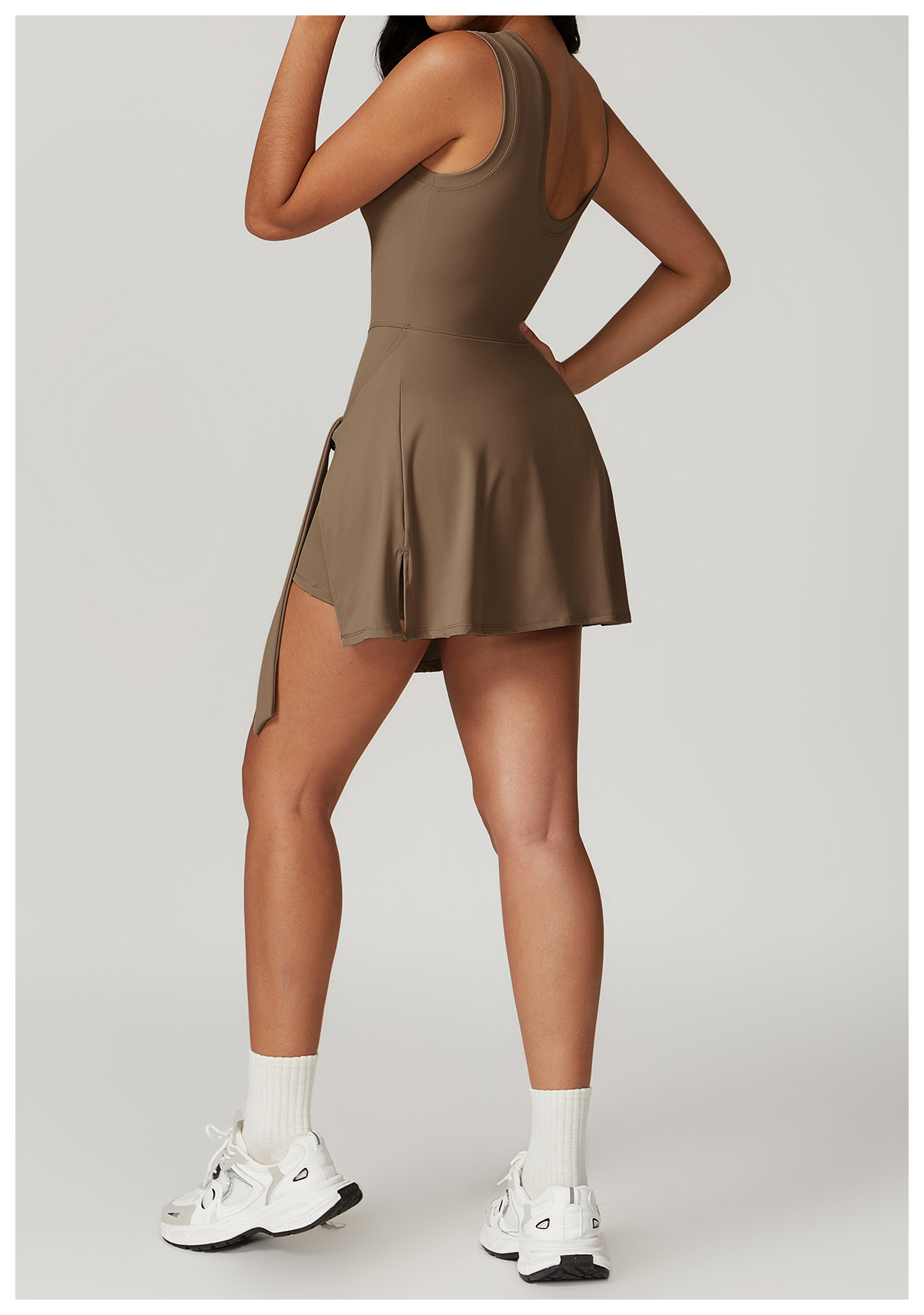 Backless athletic skort one-piece with waist tie
