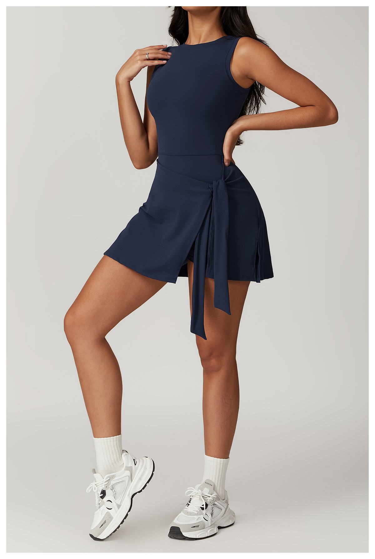 Backless athletic skort one-piece with waist tie