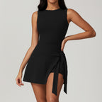 Backless athletic skort one-piece with waist tie