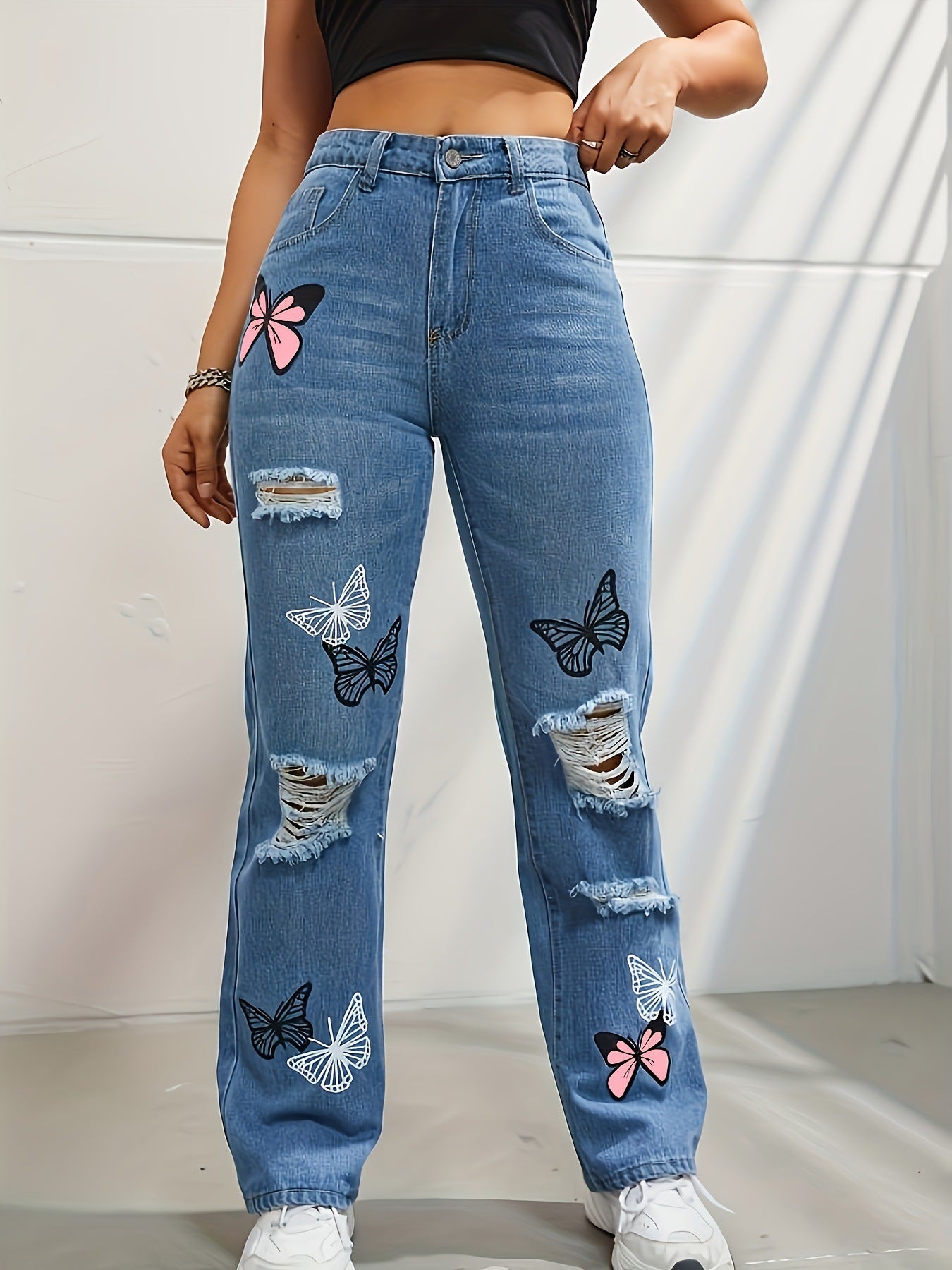 High-waist straight jeans with butterfly print
