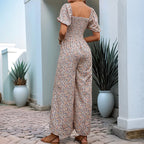 Square-neck puff-sleeve floral jumpsuit